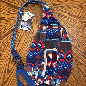 Kavu Patterned Fleece Sling Bag in Blue and Red